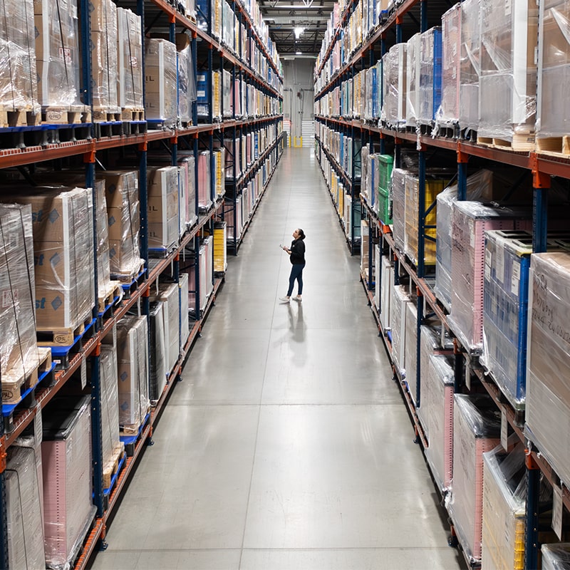 MMI Worker inside Warehouse Providing SSaaS (State Stockpile as Service)