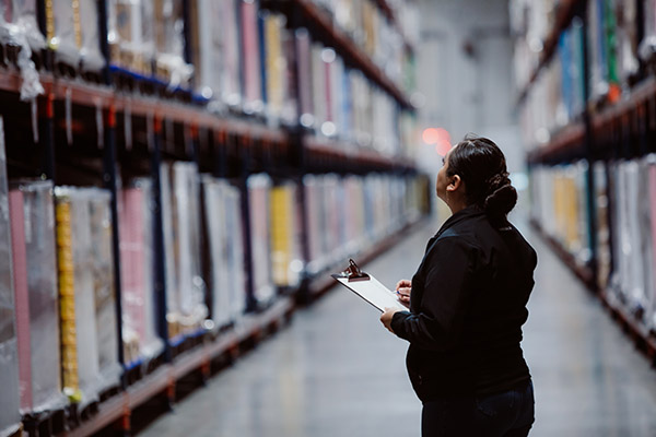 warehouse manager checking inventory