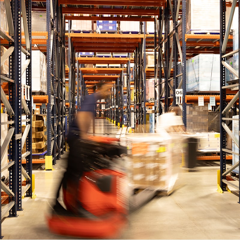 Worker Handling Supplies in the Warehouse to Meet Any Crisis