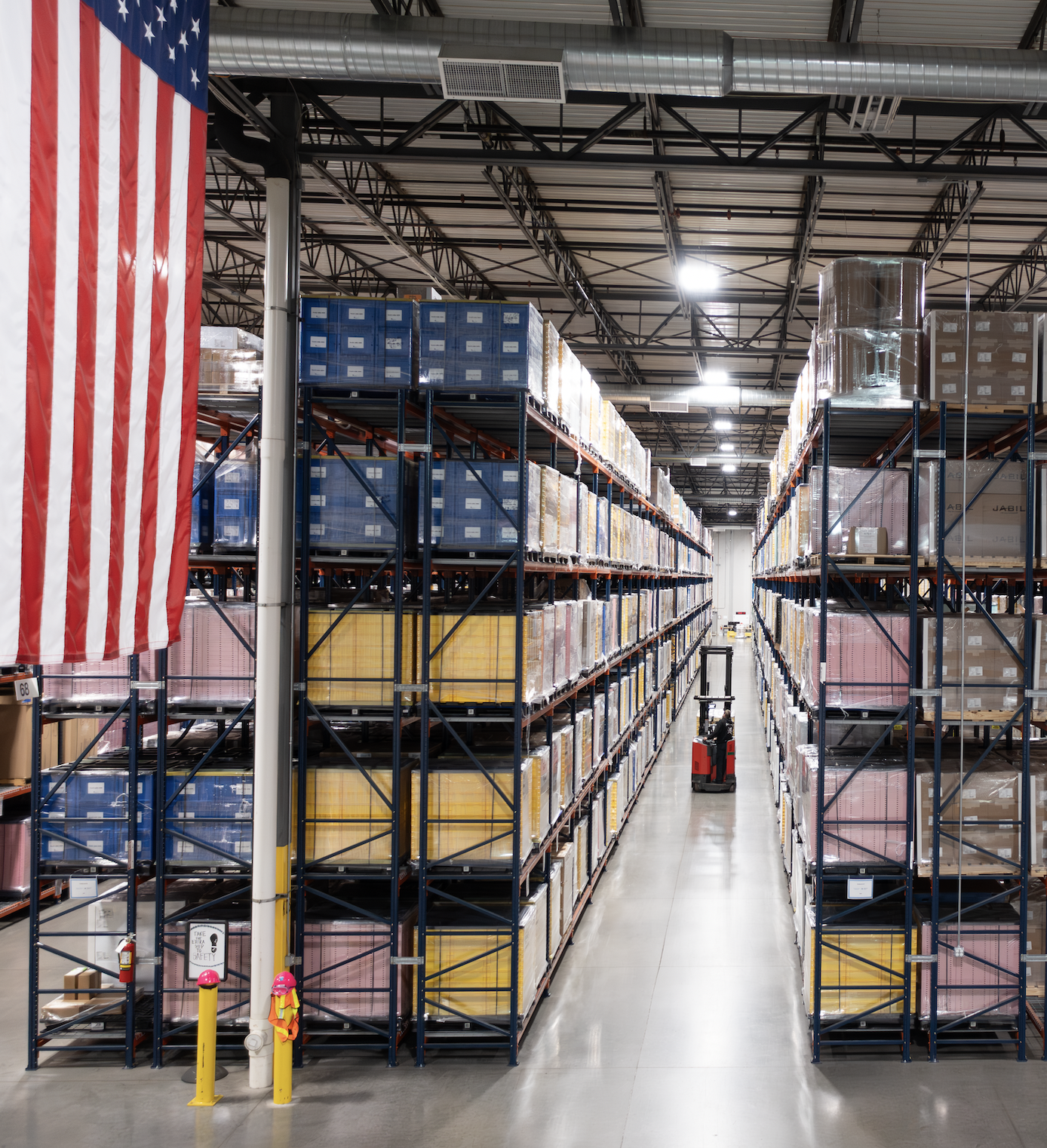 MMI Cargo Trucks Docked at Warehouse